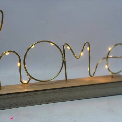 استاند خشب كلمة Home بتنور 